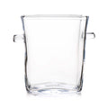 Clear glass ice bucket with two handles on sides and slightly tapered cylindrical shape.