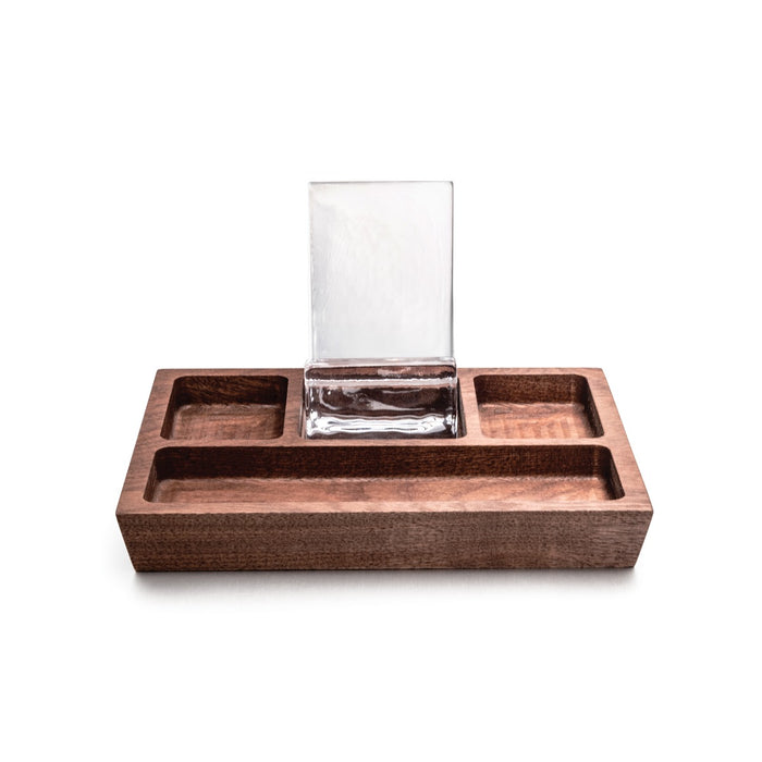 Walnut wood caddy with multiple compartments and a glass phone holder in the center.