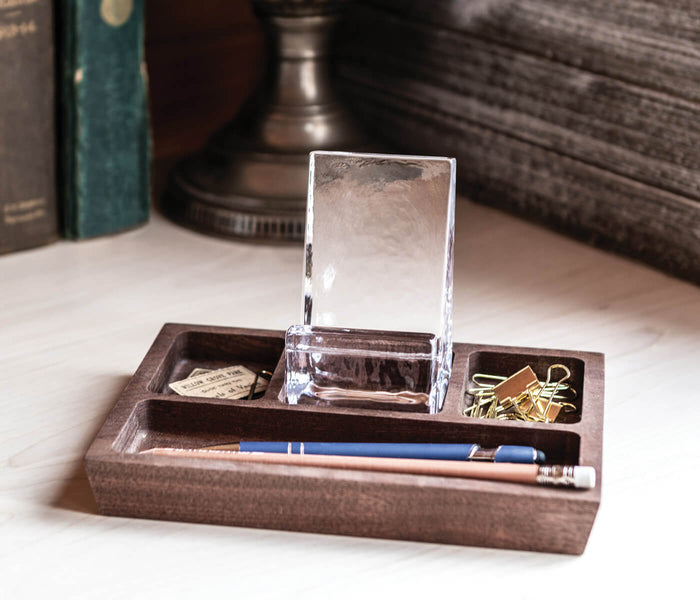 Walnut wood caddy with glass phone stand, compartments for pens and small items, displayed on desk with books and decorative