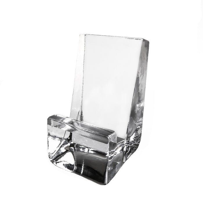 Clear acrylic phone holder with angled back panel and front slot for device placement.