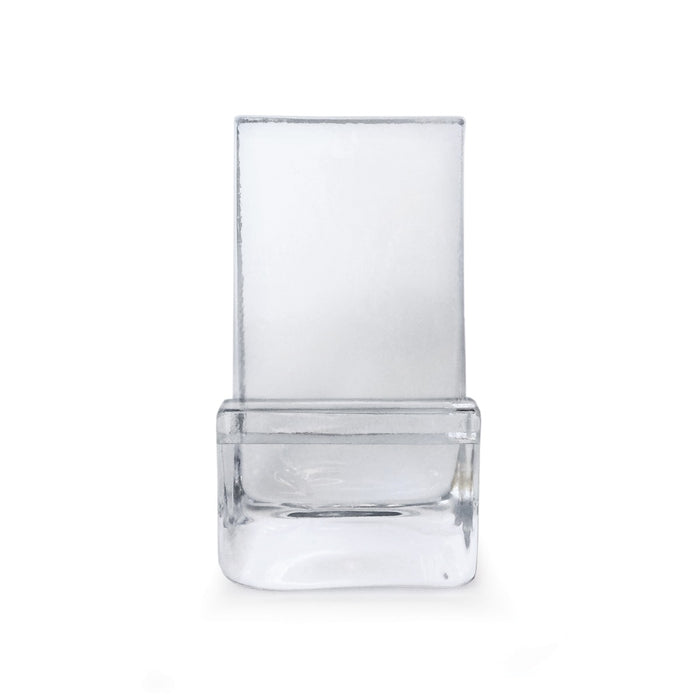 Clear acrylic phone holder with angled back panel and curved base compartment.
