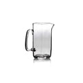 Clear glass pitcher with curved handle and tapered pouring spout.
