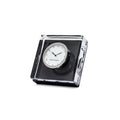 Square desk clock with white face and black hands, mounted in clear acrylic case with black base.