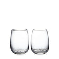 Two clear glass tumblers with curved sides and embossed base design.