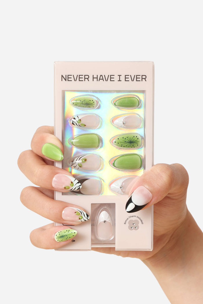 Short almond press-on nails with kiwi and zebra designs, packaged by Never Have I Ever.